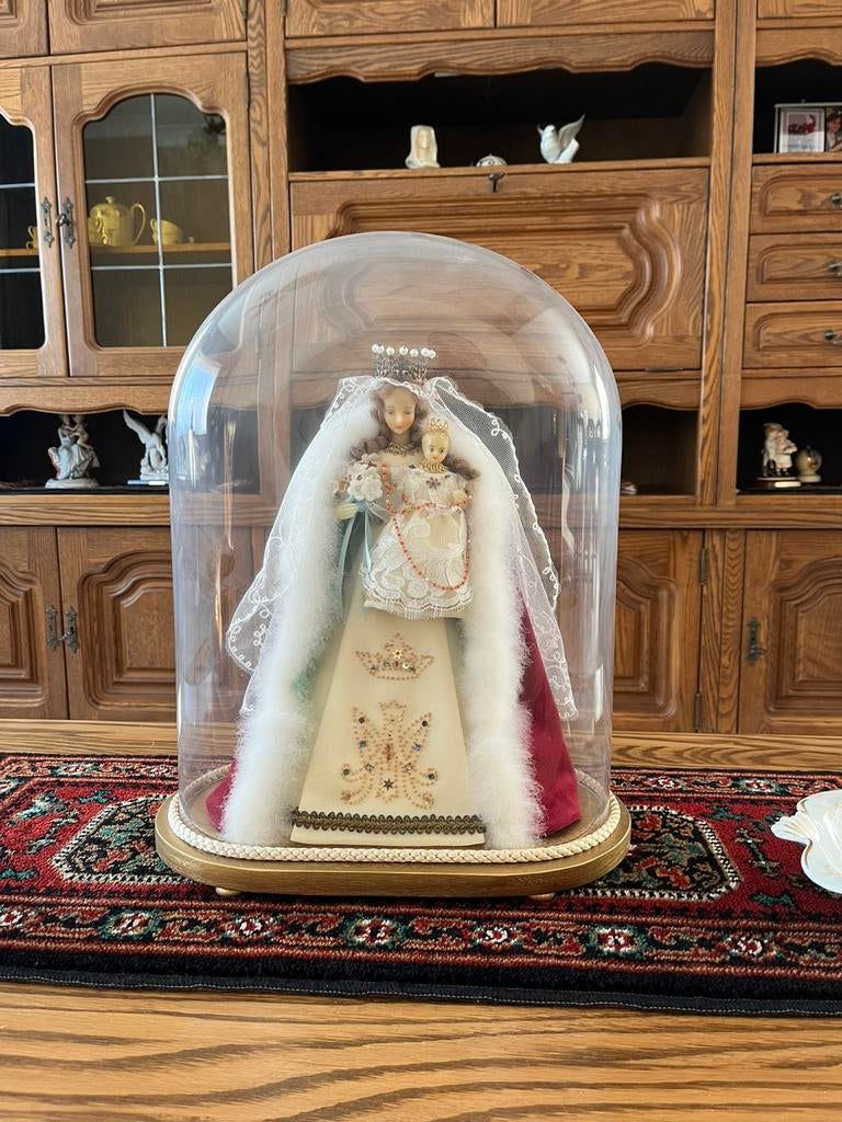 Madonna ‘s onder glazen stolp, Ophalen