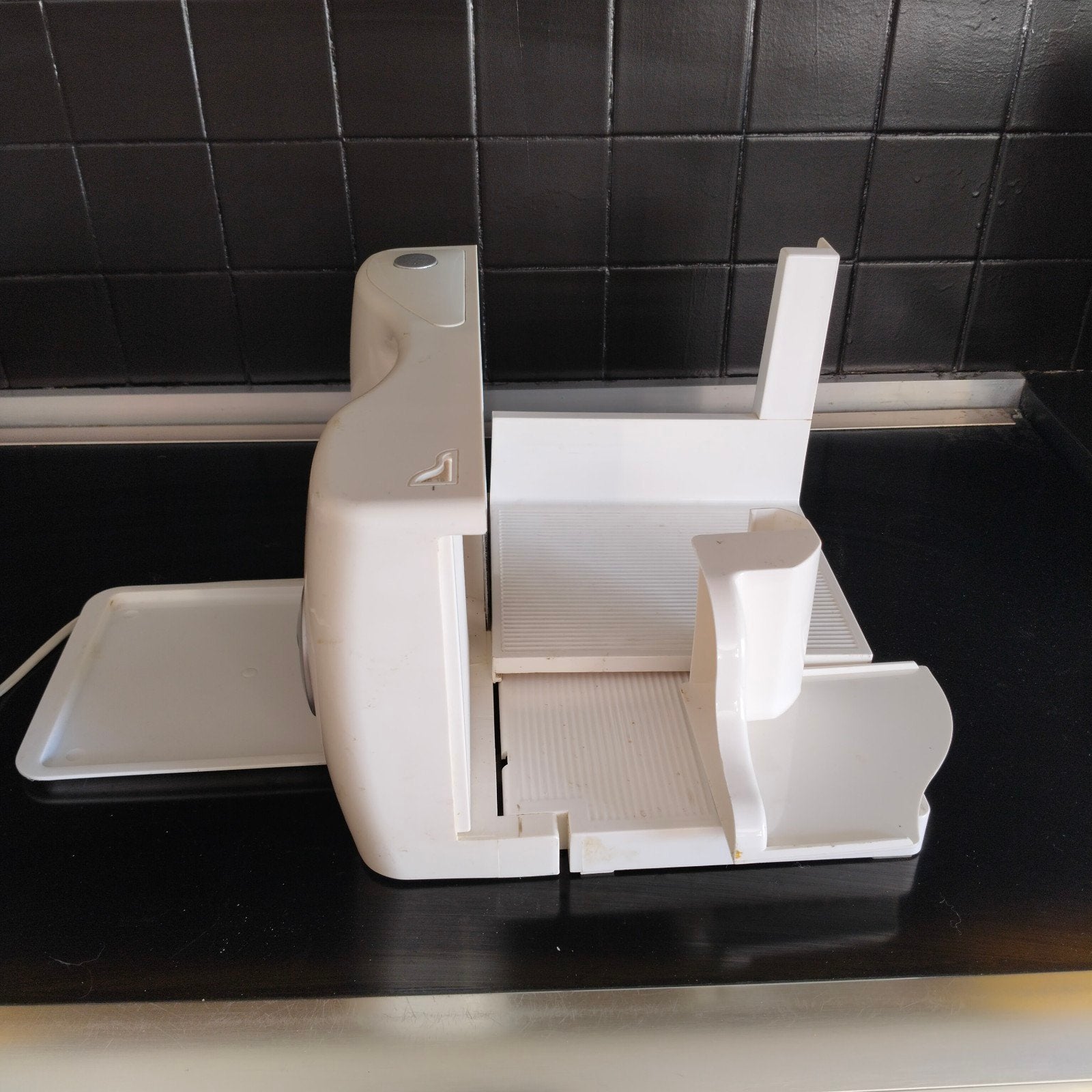 Snijmachine brood, Ophalen