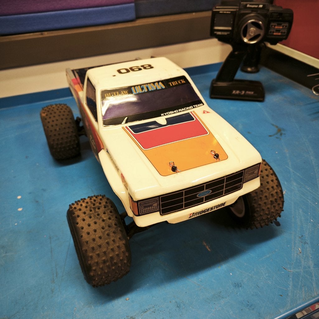 Vintage Kyosho Outlaw Ultima Truck - Compleet & Werkend, Ophalen of Verzenden, Gebruikt, 1:9 t/m 1:12, Auto