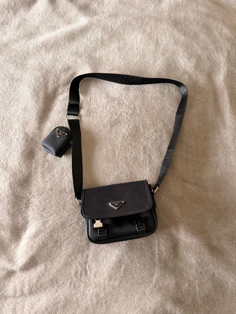 Prada tas nieuw, Enlèvement, Comme neuf