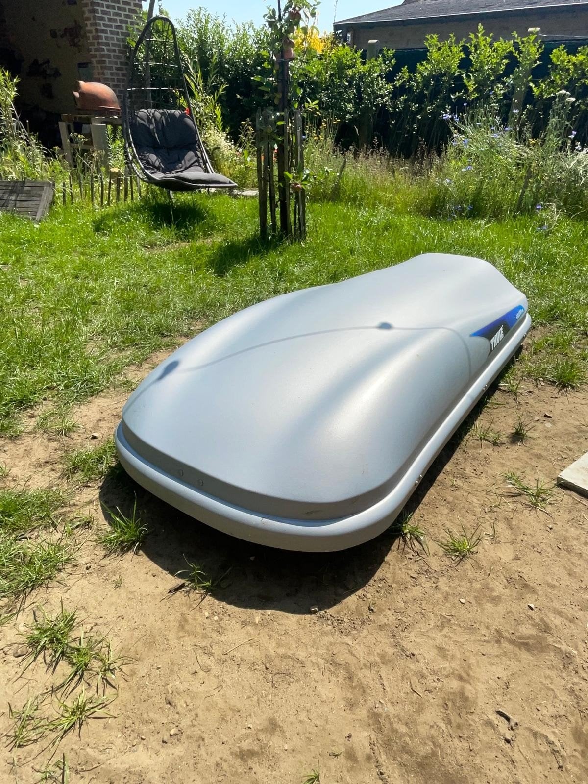 Thule dakkoffer Evolution 100, Ophalen
