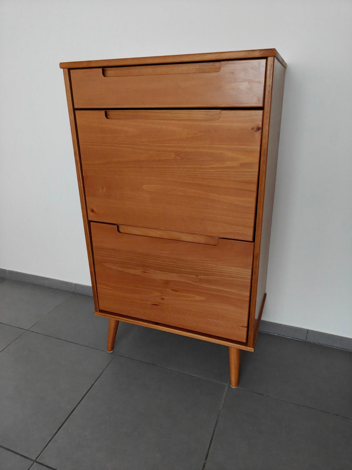 Houten schoenenkast, Ophalen