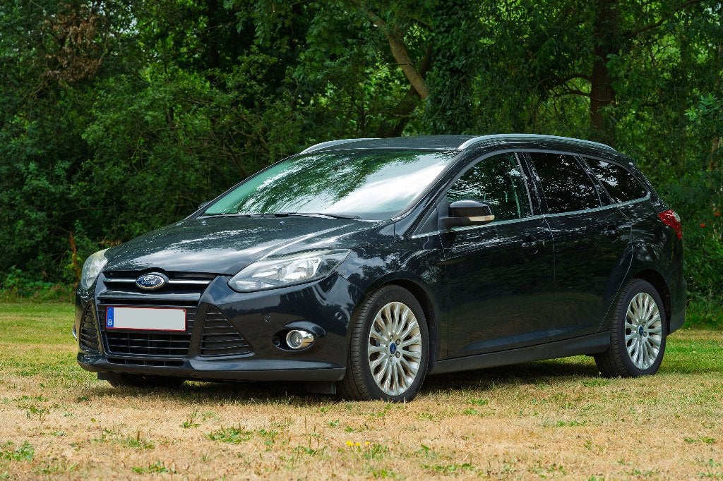 FORD FOCUS SW 2.0 TDCI AUT NAV LEDER AIRCO VOOR EXPORT, Autos, Euro 5, Carnet d'entretien, Noir, 5 portes