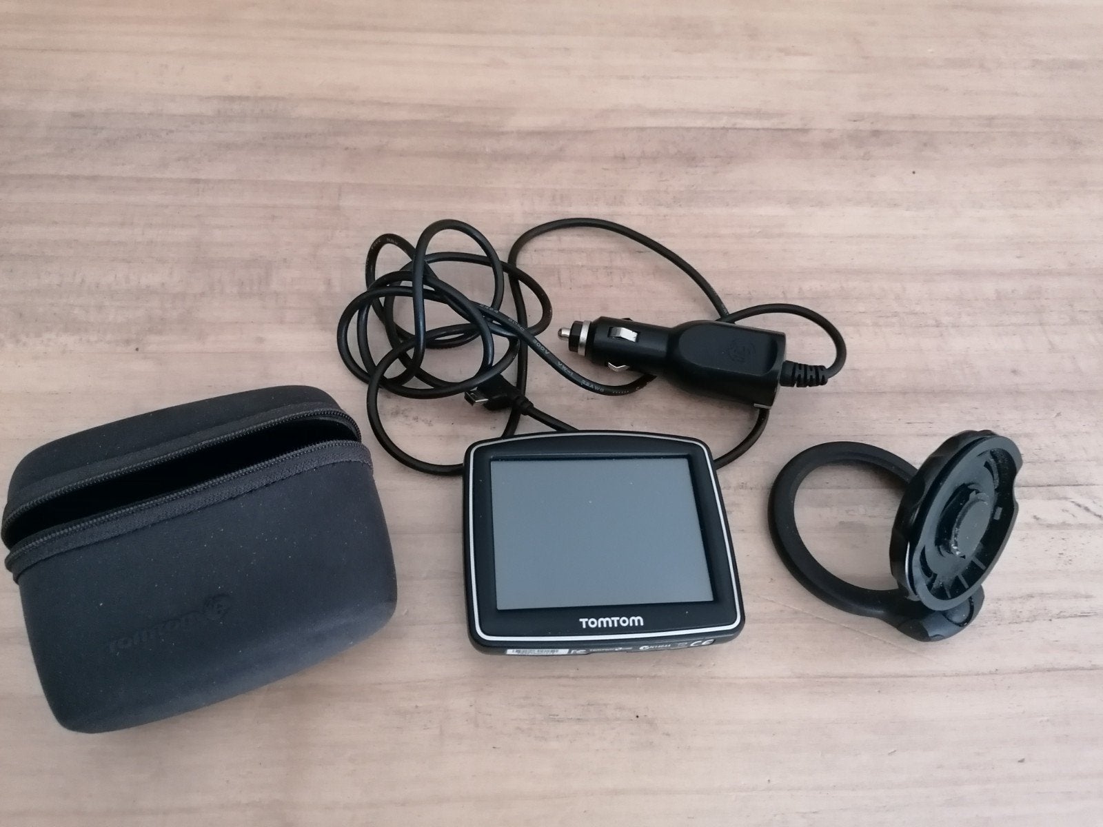 GPS Tomtom one met tas en oplader, Ophalen