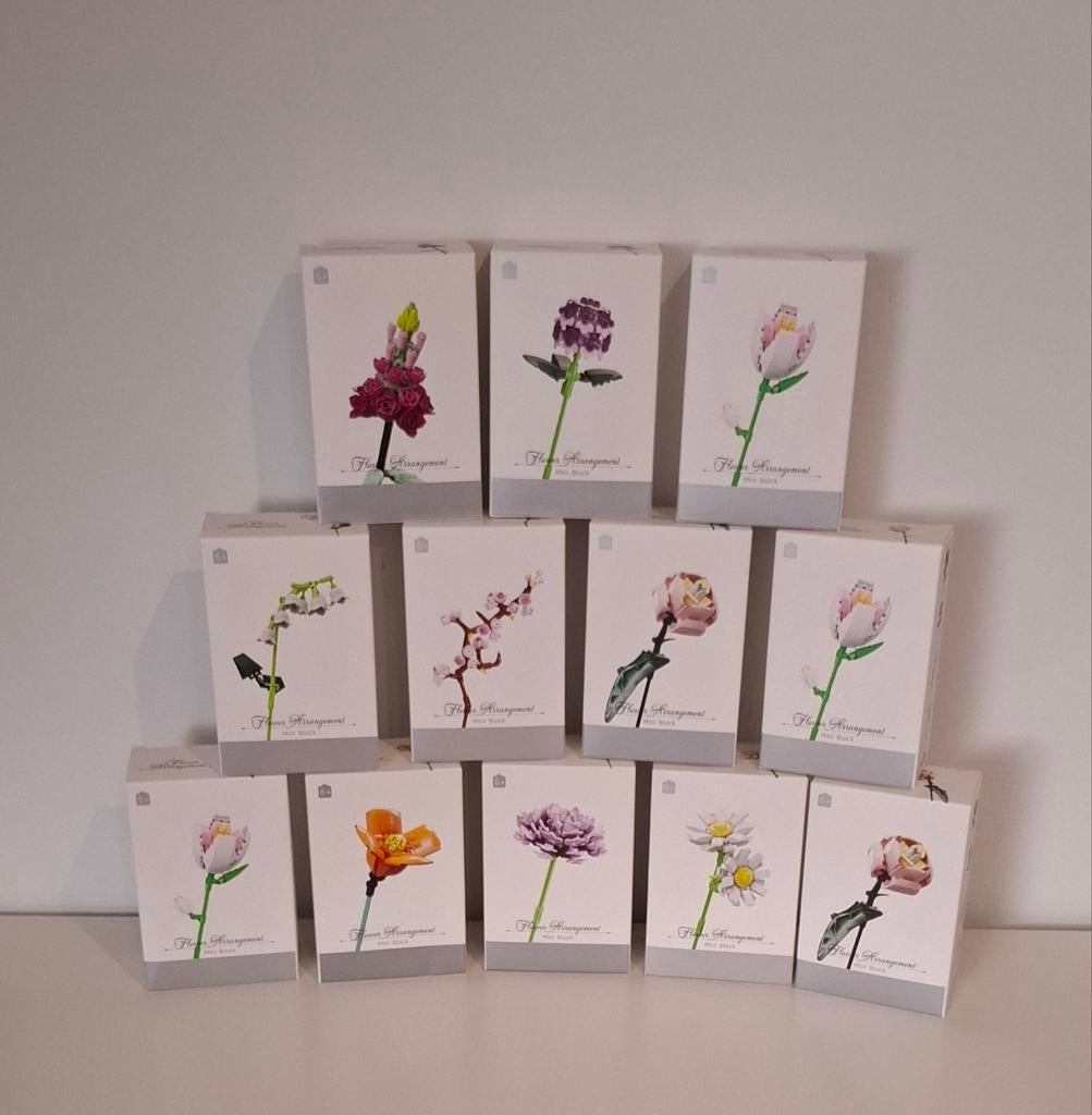 12 nieuwe doosjes bloemen bouwsteentjes zoals lego, Ophalen of Verzenden