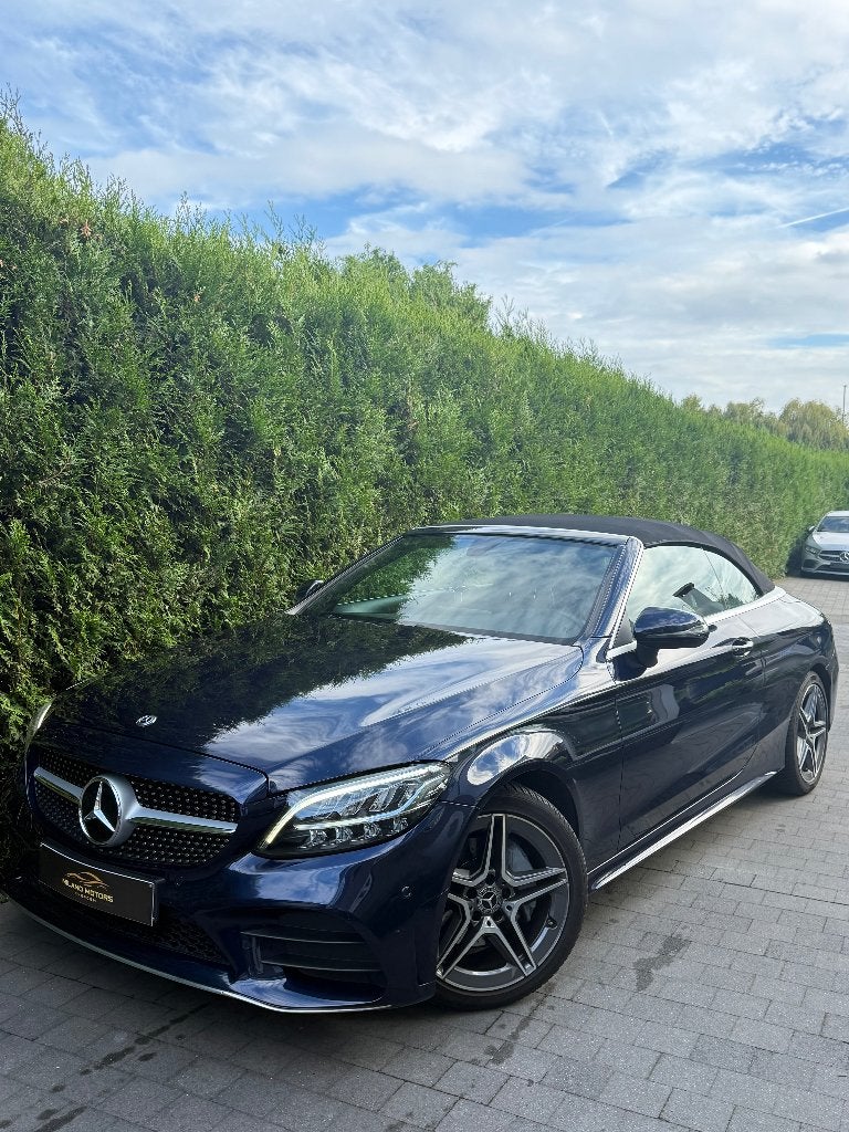 Mercedes-benz C200 Cabrio facelift AMG, Auto's, Dealer onderhouden, 4 cilinders, Cabriolet, Blauw