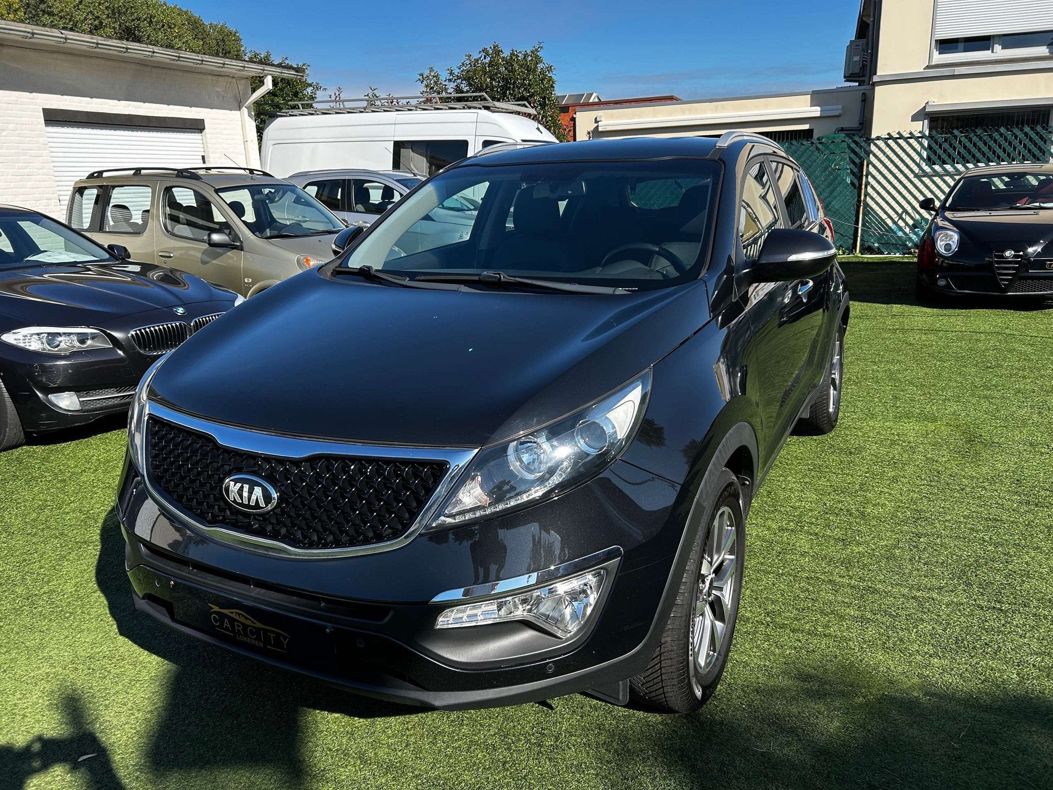 Kia Sportage 1.6i 2WD World Edition °LEDER° GPS ° CAMERA, Voorwielaandrijving, Gebruikt, 149 g/km, Zwart