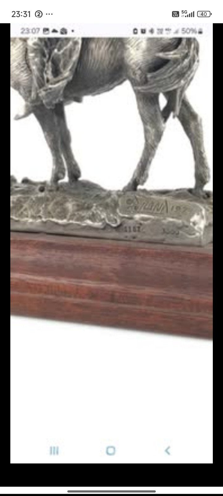 Sculpture antique signée Donald Polland 1974, Enlèvement
