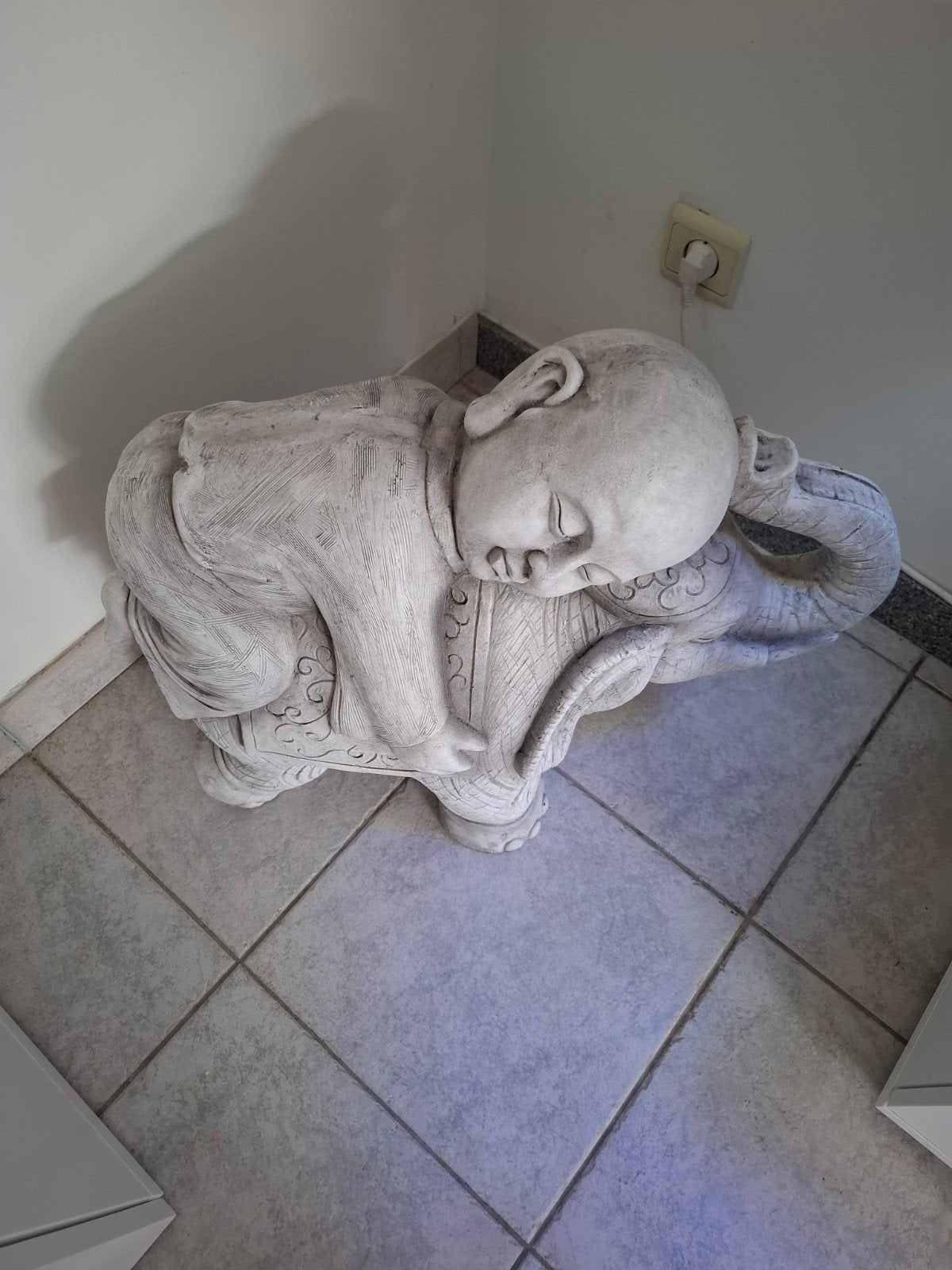 Bouddha sur éléphant, Enlèvement
