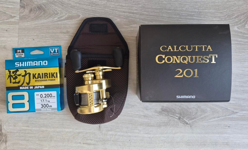 Shimano calcutta conquest 201 baitcastreel nieuwstaat, Ophalen of Verzenden, Nieuw, Molen