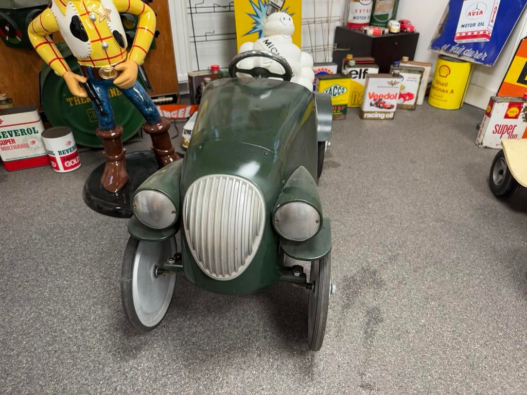 Oude metalen trapauto, Ophalen