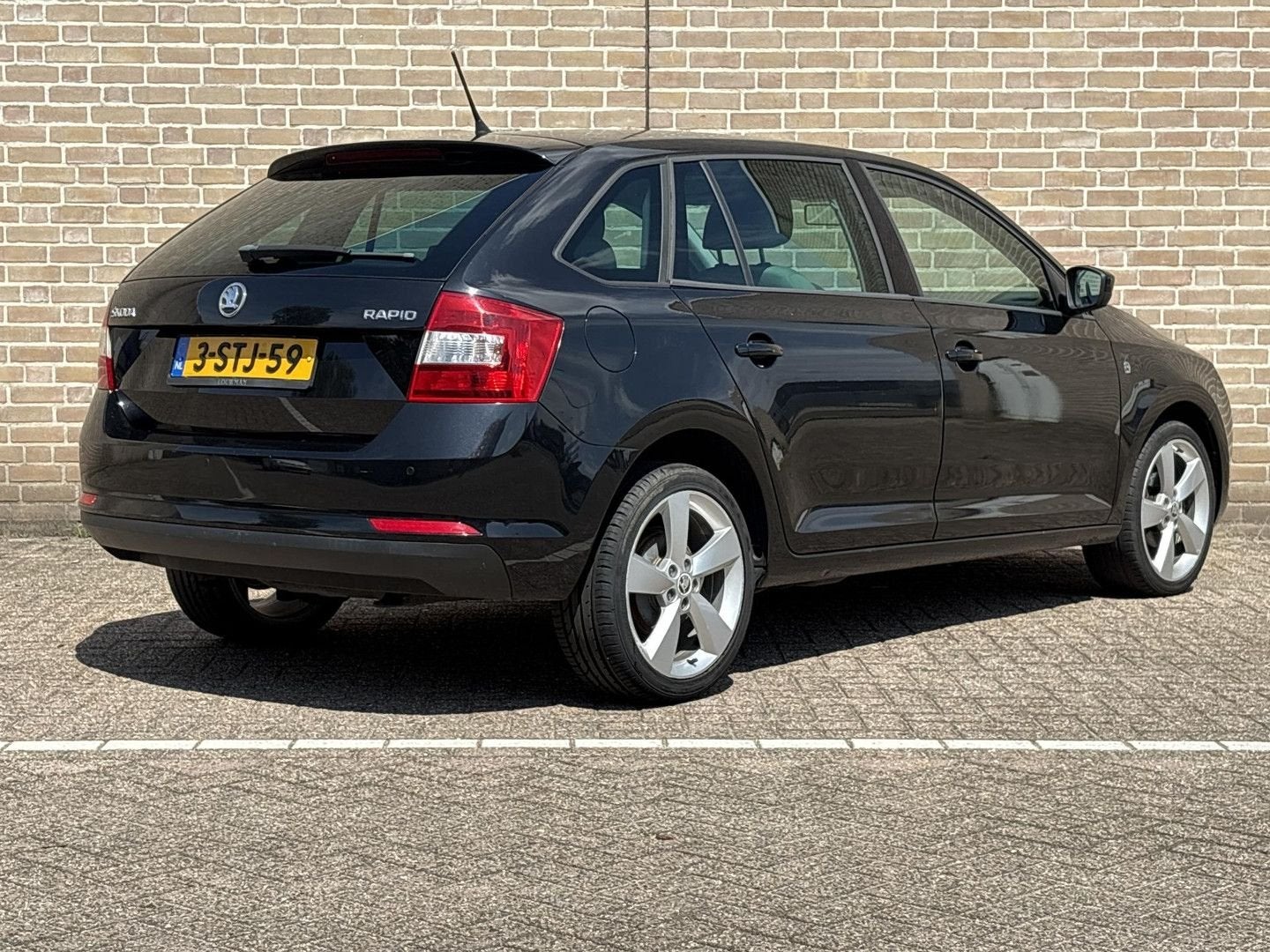 Skoda Rapid Spaceback 1.2 TSI Greentech Elegance Businesslin, Beige, Navigatiesysteem, Zwart, Bedrijf