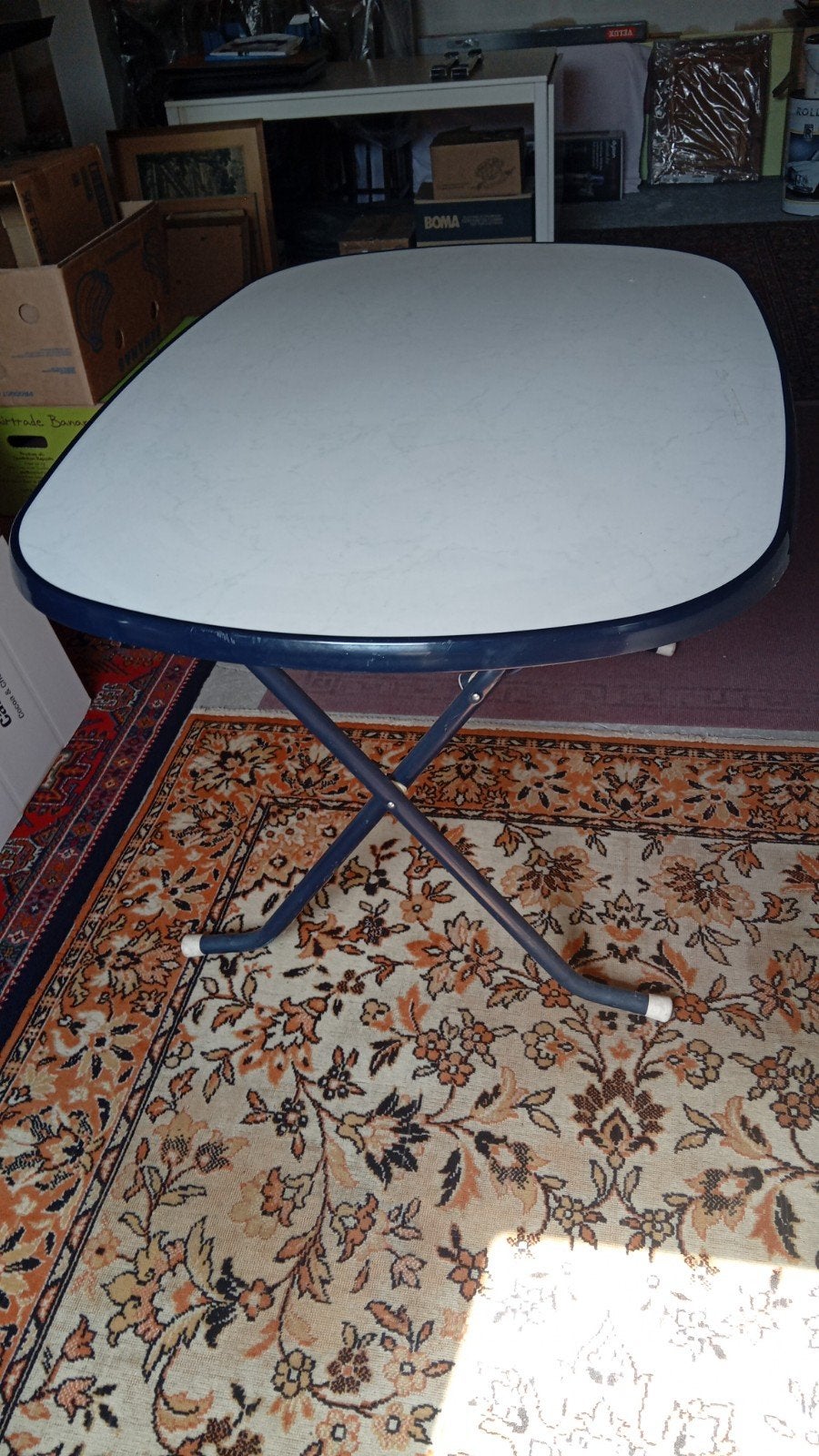 Tuintafel te plooien, Ophalen