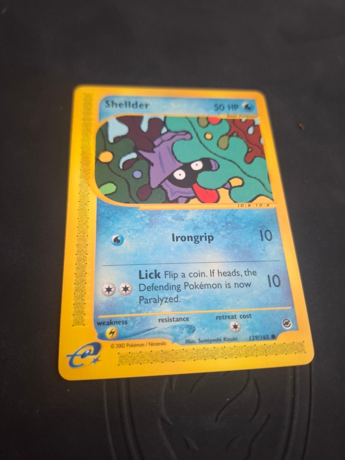 Shellder Pokémon Kaart 129/165 - Aquapolis, Ophalen of Verzenden