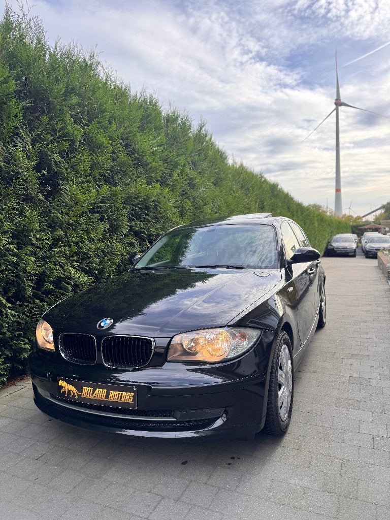 BMW 116I 2009 Opendak, Auto's, BMW, Zwart, 4 cilinders, Zwart, Bedrijf
