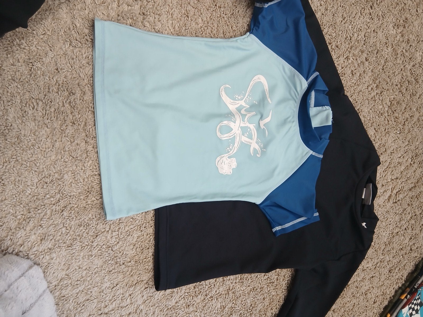 zwem t-shirt de blauwe maat 122/128 en de zwarte maat 8, Ophalen