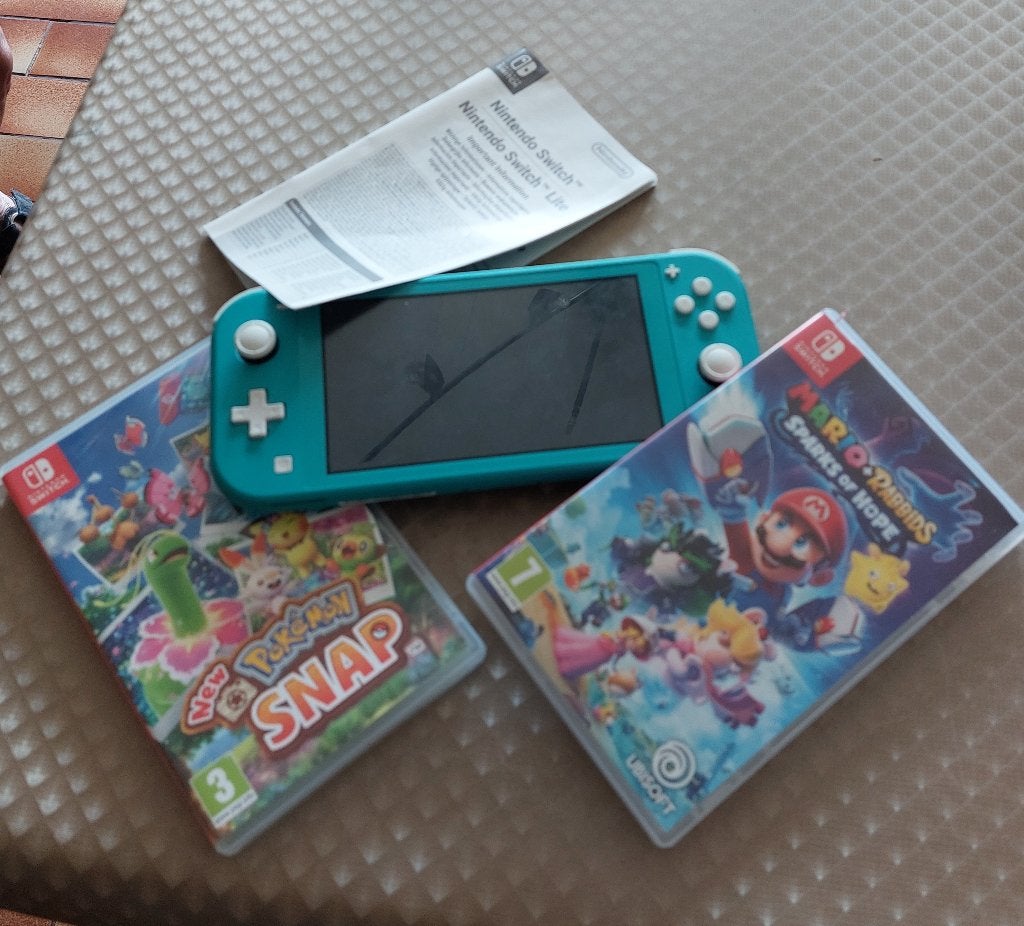 NINTENDO switch lite + extra, Ophalen, Turquoise, Zo goed als nieuw