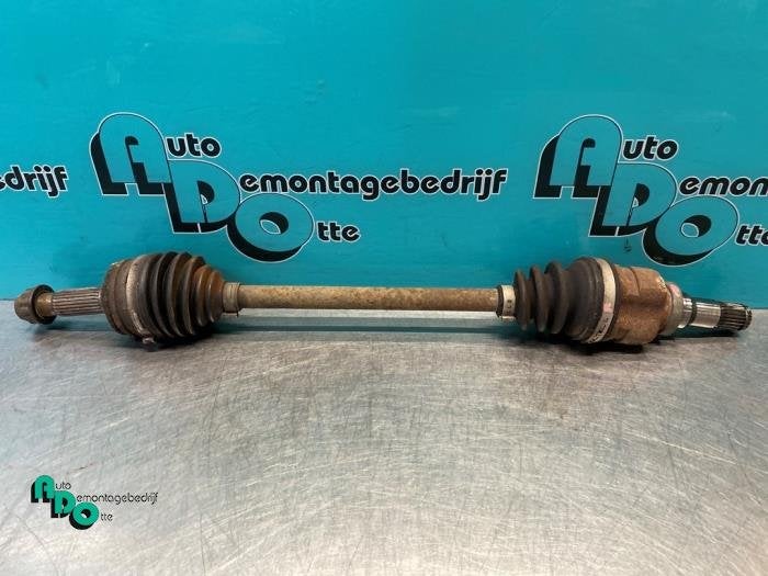 Arbre de transmission avant gauche d'un Toyota Aygo (Aygo 08, -, 3 mois de garantie, Toyota, Utilisé
