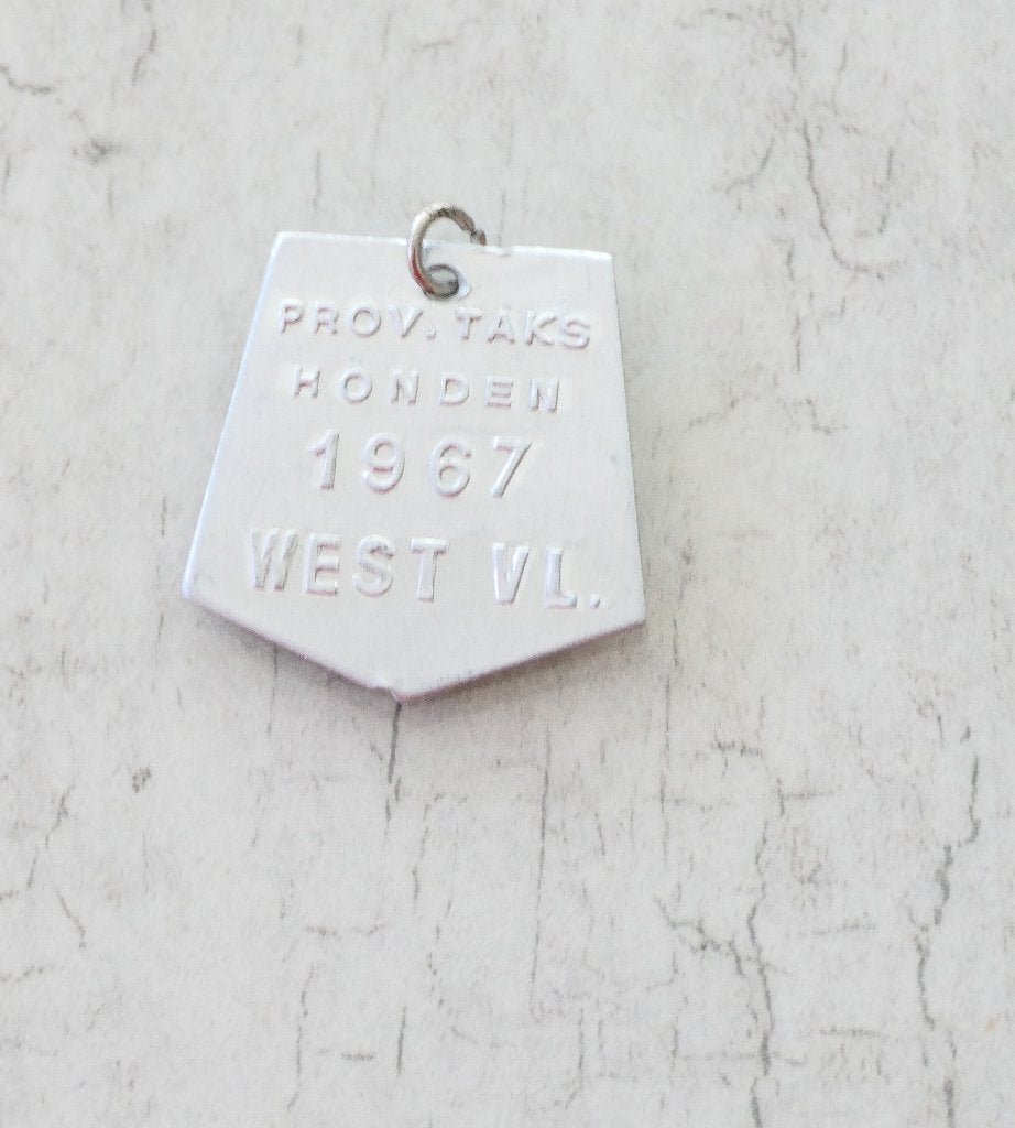 Hondentaks medaille, Ophalen