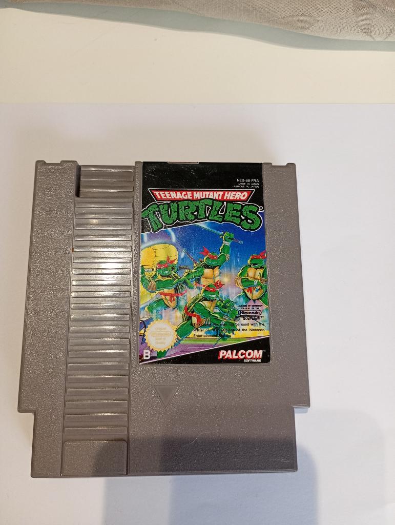 Jeu NES TMNT (teenage mutant hero turtles), Enlèvement ou Envoi, 1 joueur, À partir de 7 ans, Aventure et Action