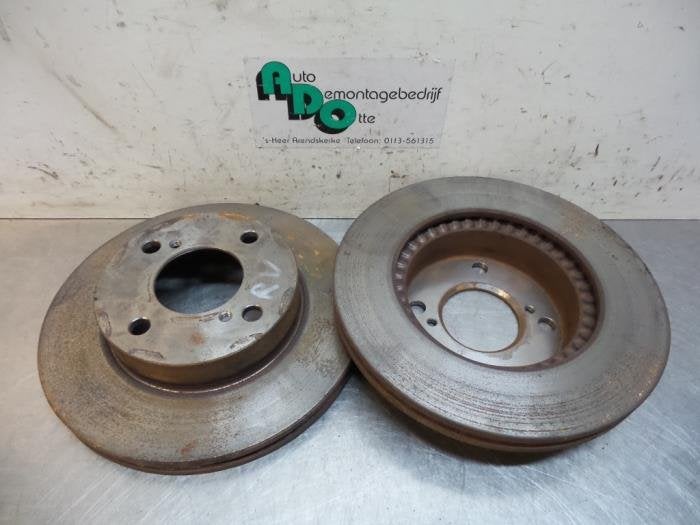 Disque de frein avant d'un Nissan Pixo (Pixo 09-), -, 3 mois de garantie, Utilisé, -