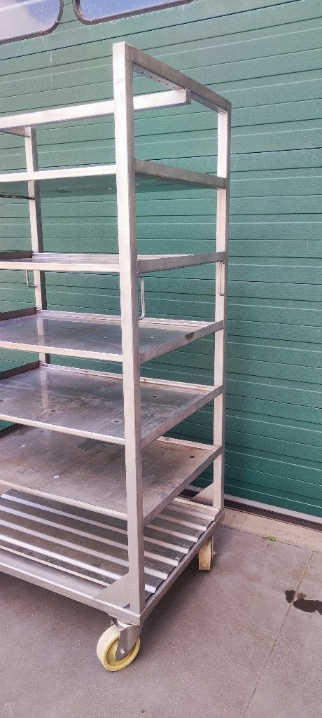 inox kar met inox met met grote wielen, Ophalen