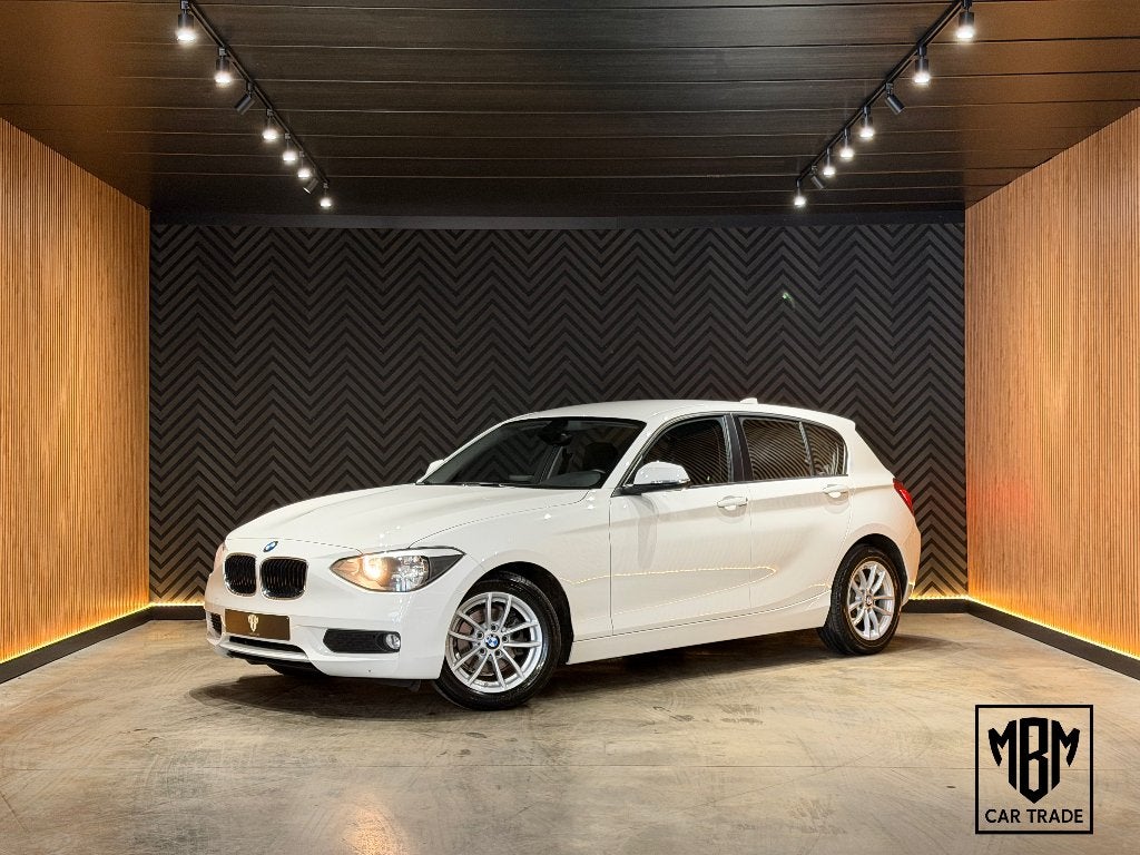 ✅ BMW 114 i 12 Maanden GARANTIE Navi Zetelverw. Parksensoren, Autos, 75 kW, Achat, Euro 6, Entreprise