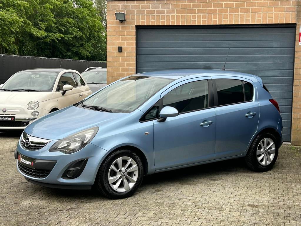 Opel Corsa 1.2 Edition Airco Navigatie Cruise Onderhoudsboek, Auto's, Voorwielaandrijving, Euro 5, 4 cilinders, Blauw