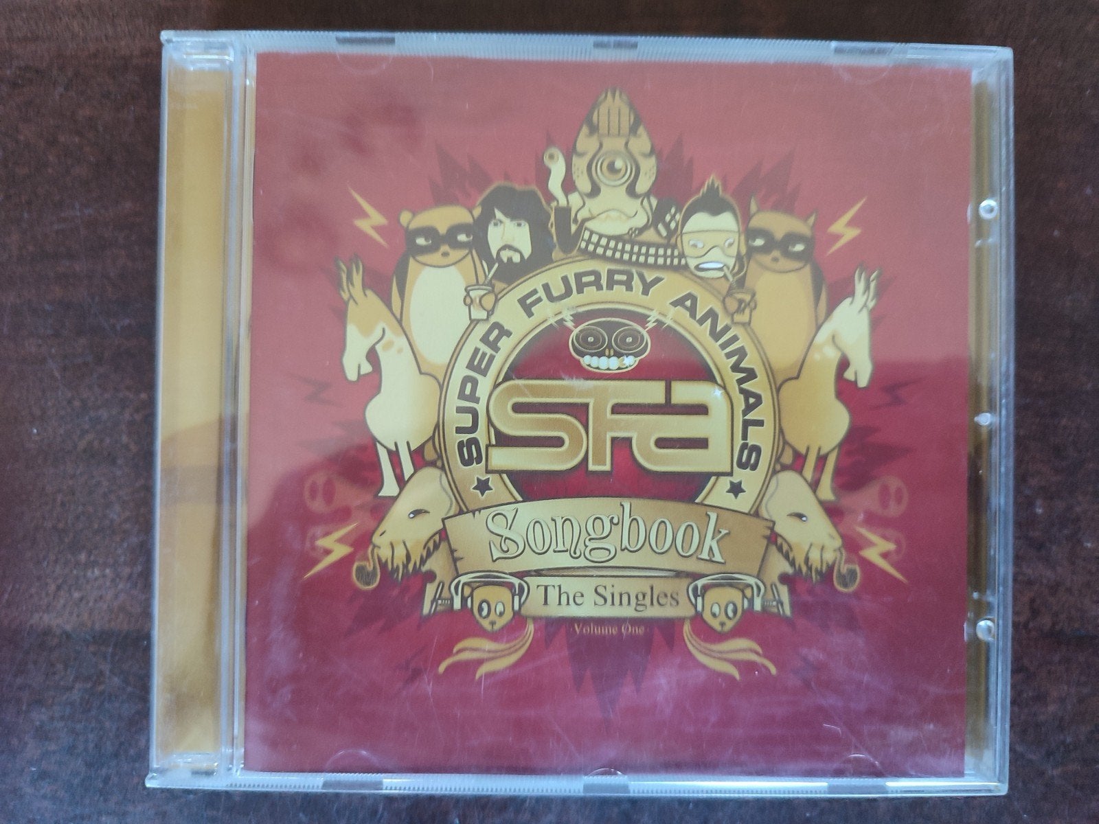 CD : SUPER FURRY ANIMALS - SONGBOOK VOL 1 : THE SINGLES, Ophalen of Verzenden, Zo goed als nieuw