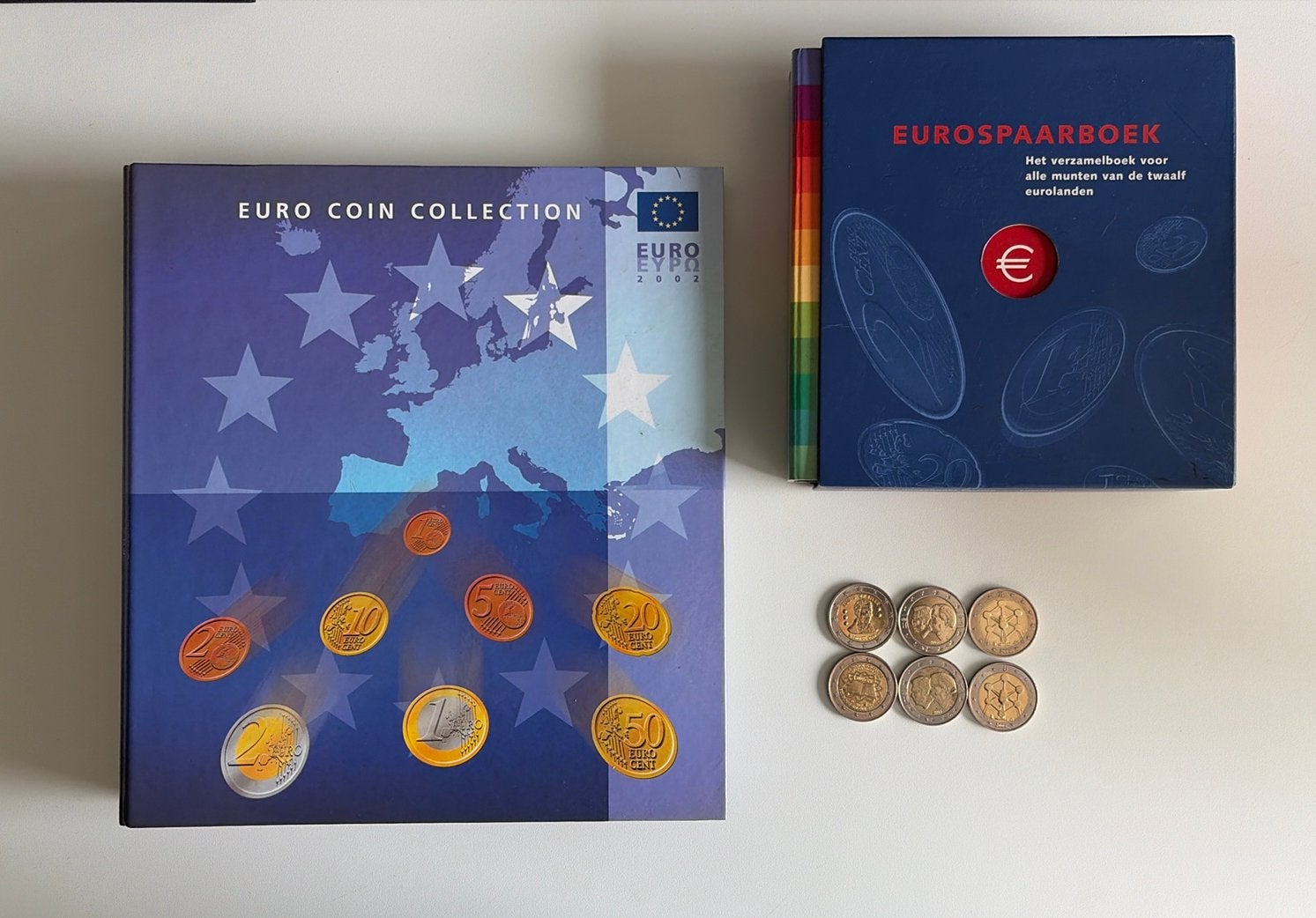 Twee complete euromunten albums 2002 + 6x Speciale 2 Euro, Ophalen of Verzenden, België, Overige waardes