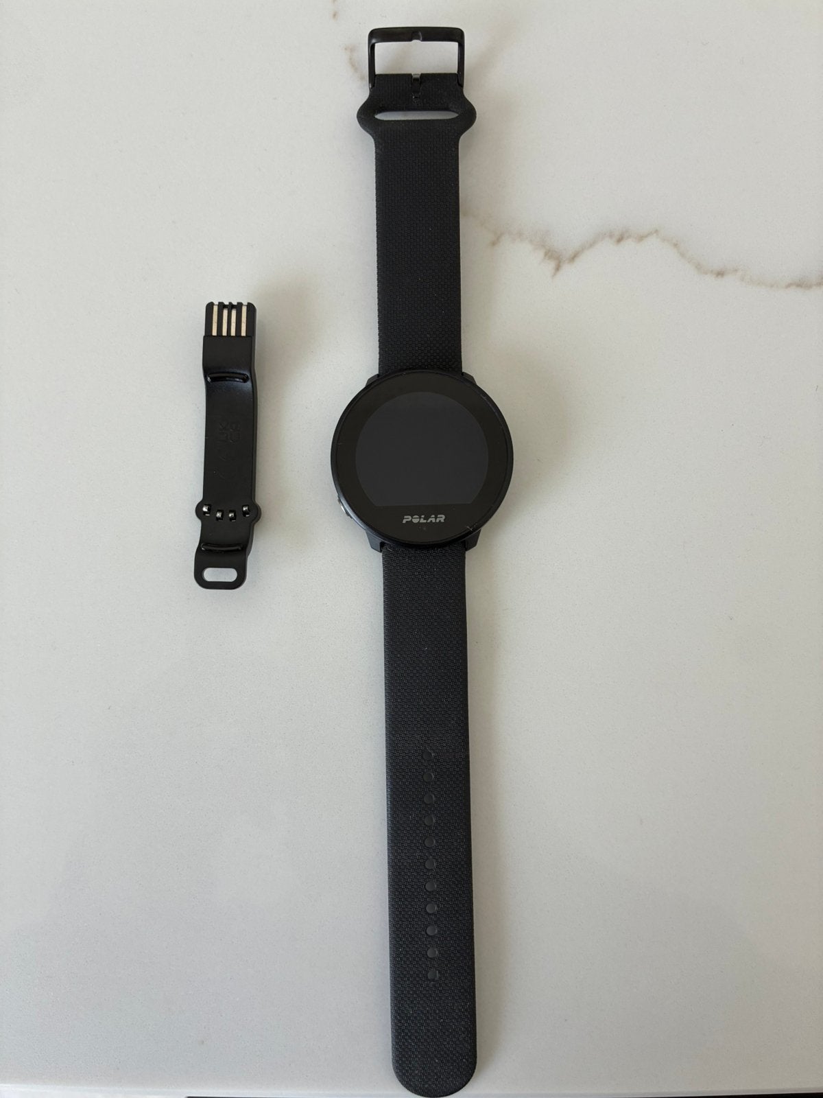 Polar unite fitnesswatch, Ophalen of Verzenden, Zo goed als nieuw, Zwart