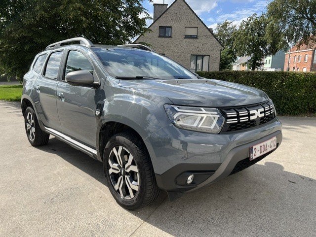 Dacia Duster AUT 1.3 benzine MET 89.000km EN navi, Auto's, Automaat, Stof, Duster, 5 zetels