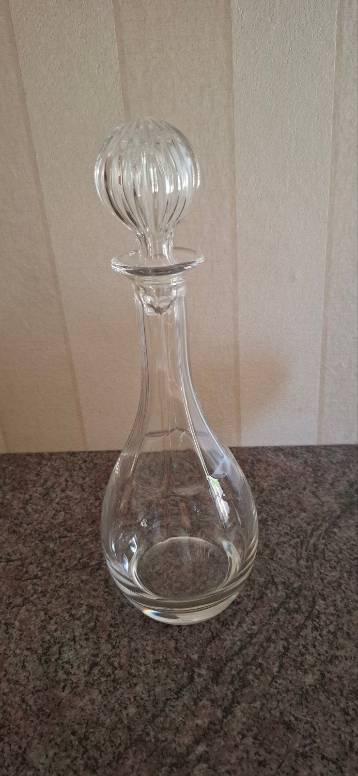 Glazen fles voor drank in te doen, Ophalen