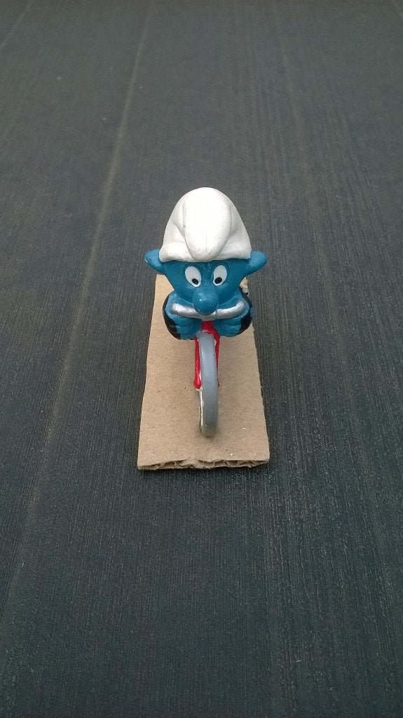 Supersmurf Wielrenner 4.0501, Verzamelen, Smurfen, Ophalen of Verzenden, Gebruikt, Overige Smurfen, Poppetje, Figuurtje of Knuffel
