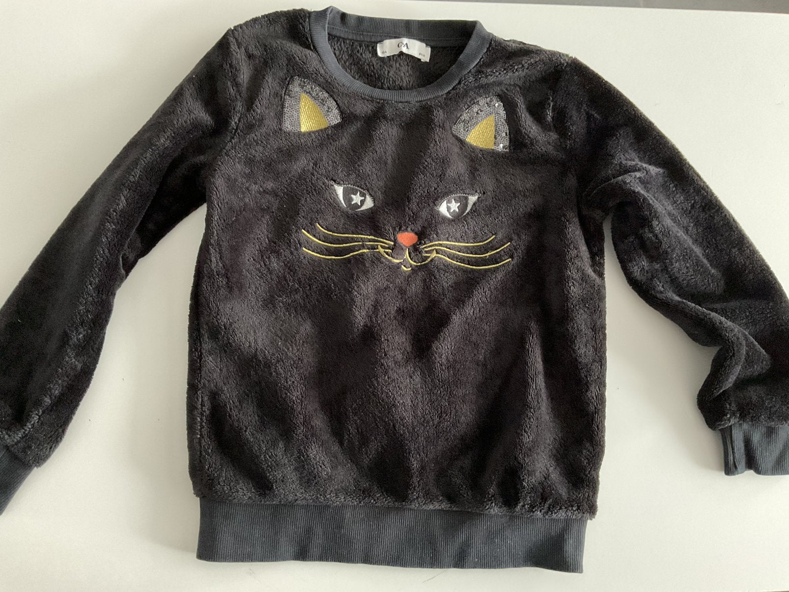 Zachte, zwarte sweater met kat (maat 134), Ophalen of Verzenden, Zo goed als nieuw