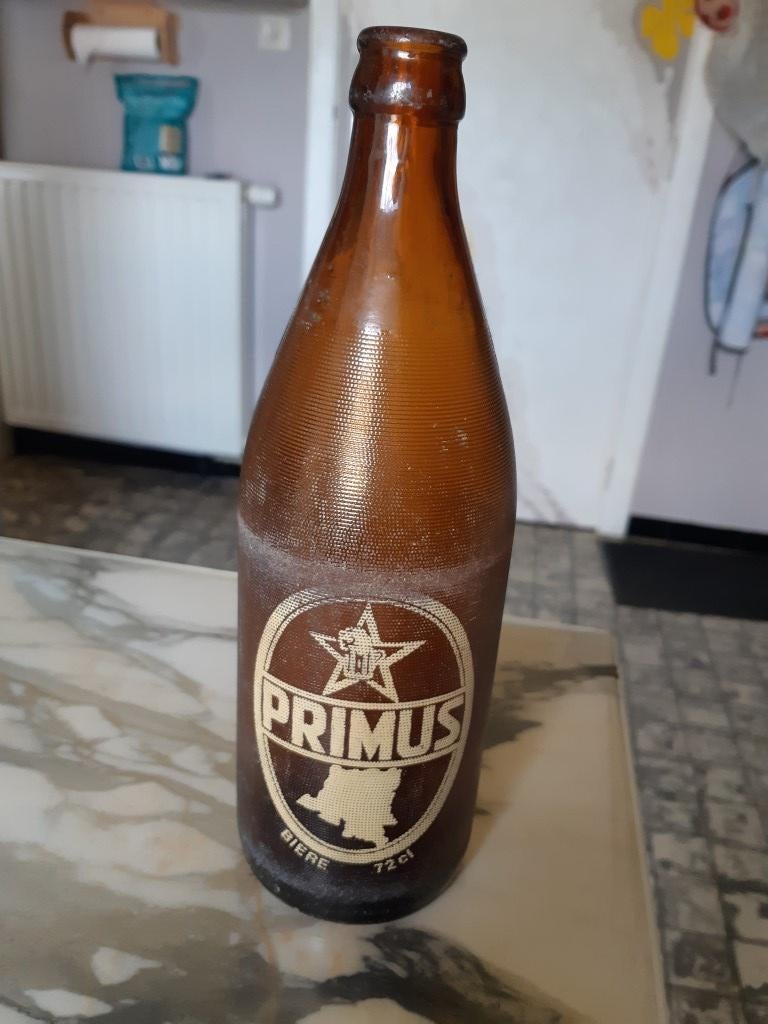 Twee oude lege  flessen van congolees bier PRIMUS, Enlèvement ou Envoi, Utilisé, Bouteille(s), Autres marques