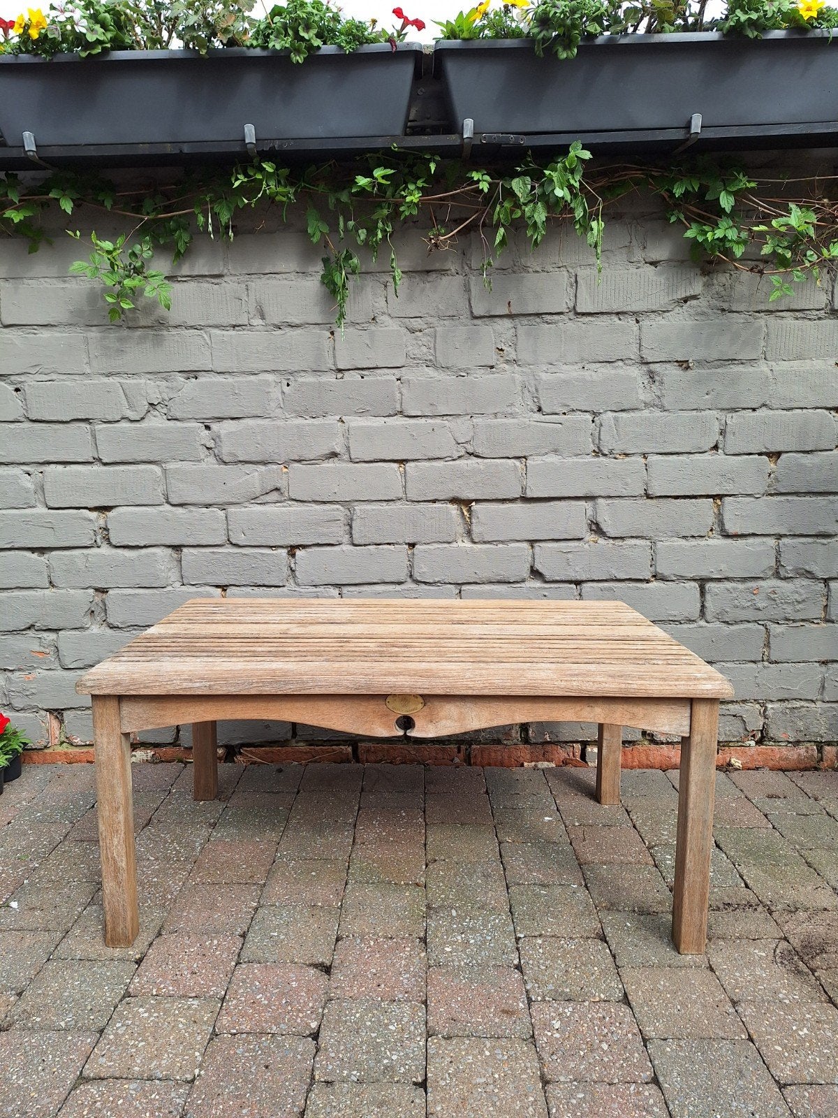 Teaken salontafel, Ophalen