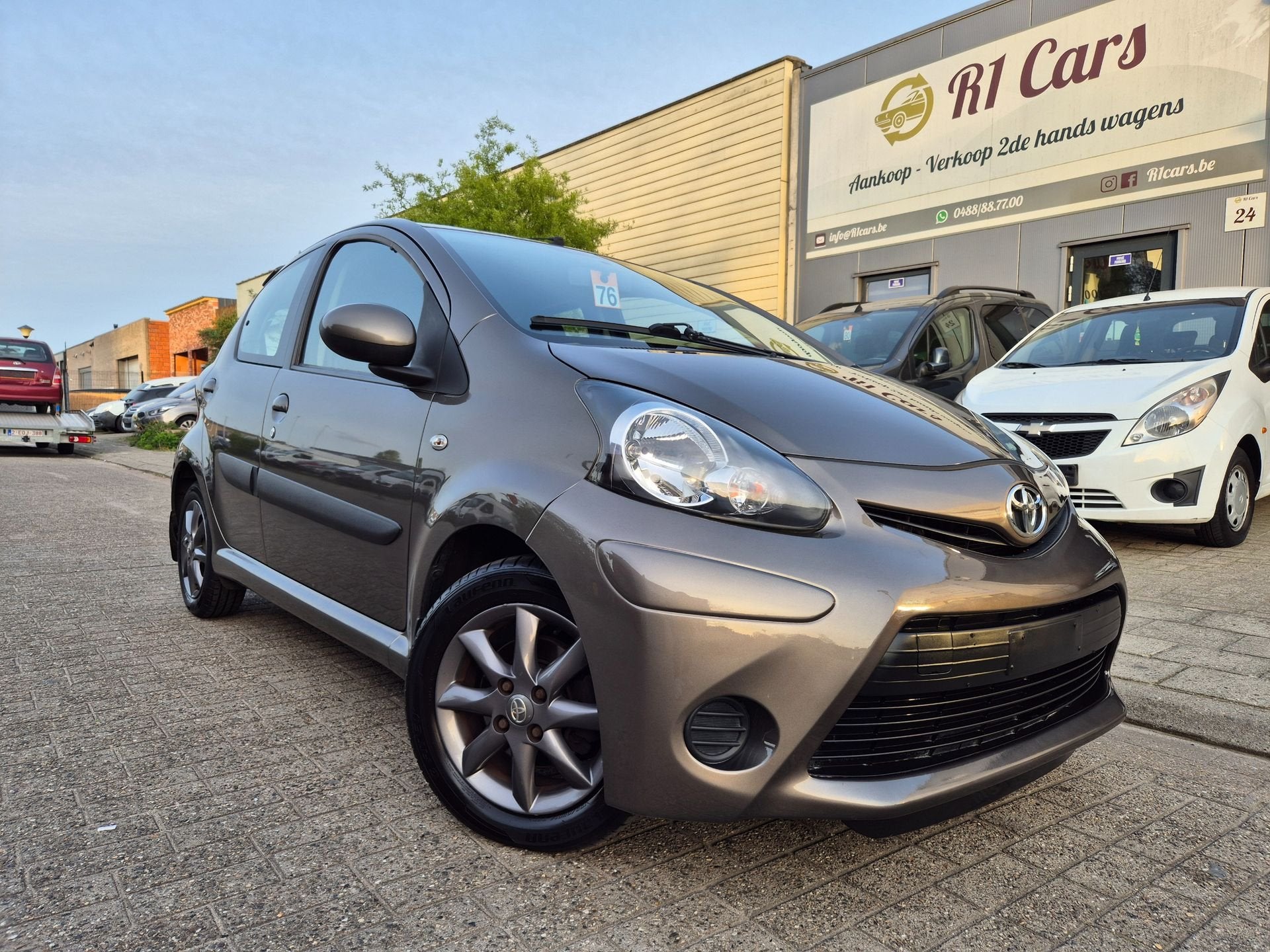 Toyota Aygo 1.0i 2013/155.000km/Airco/Pdc/Navi/12M Garantie!, Voorwielaandrijving, Gebruikt, Bruin, Elektrische ramen