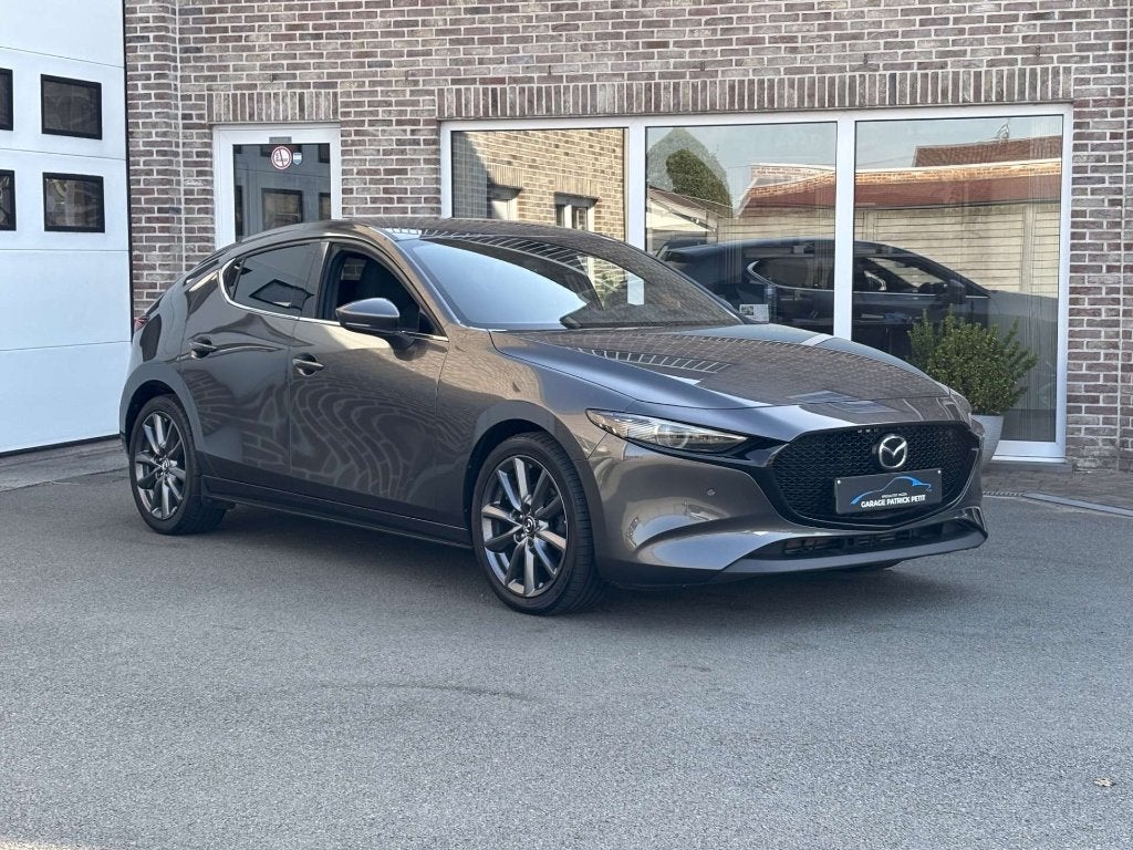 Mazda 3 2.0 M-HYBRID / 150pk / Trekhaak / 96000km, Auto's, Mazda, Voorwielaandrijving, Regensensor, Stof, Bedrijf