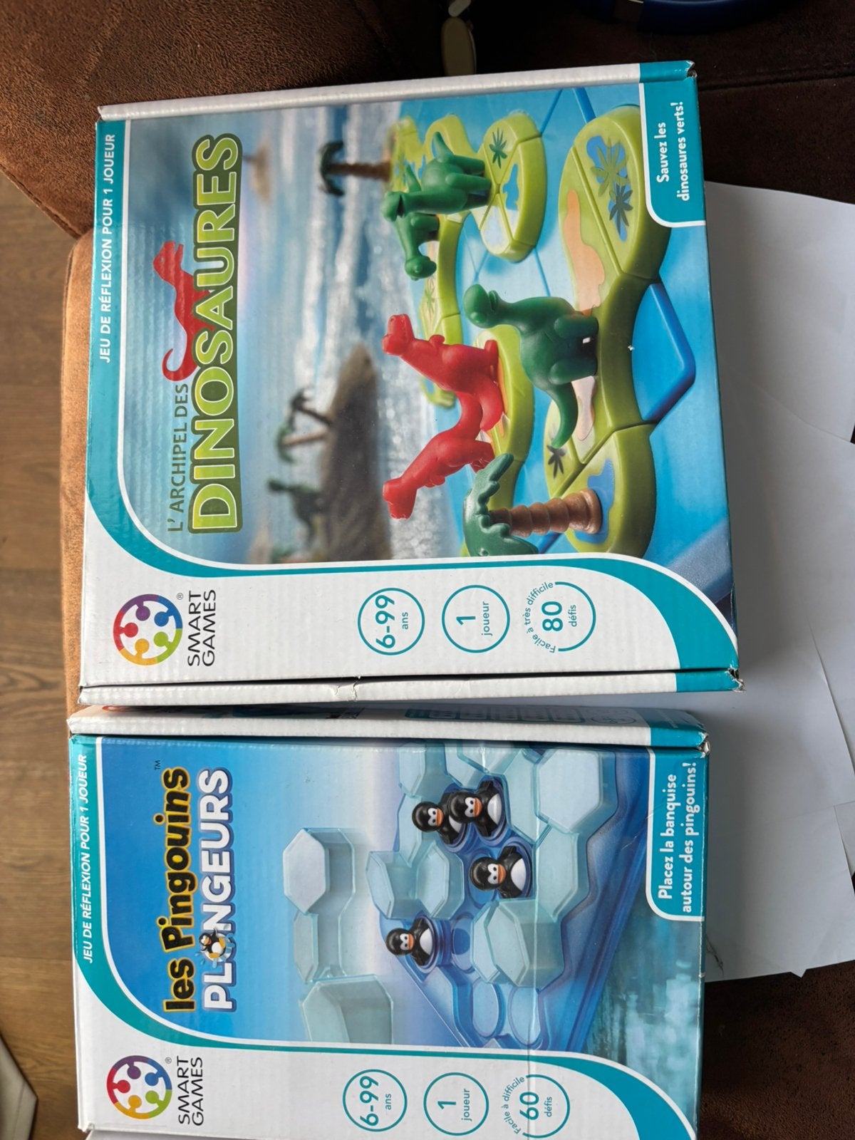 Twee smartgames, doosjes met pinguïns en dinosaurussen, Kinderen en Baby's, Ophalen of Verzenden, Zo goed als nieuw