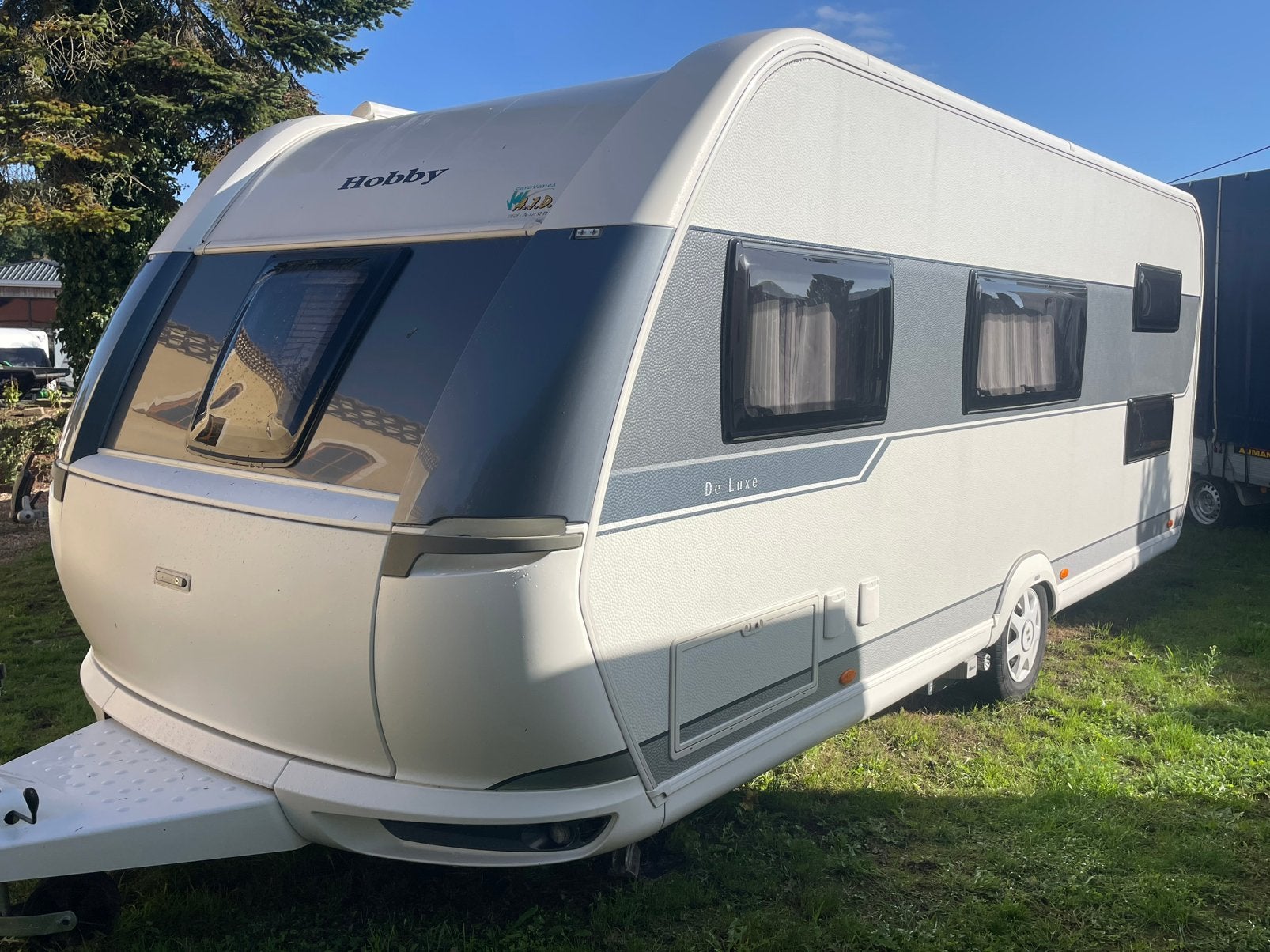 Mooie 6 persoons caracan Hobby De Luxe 545KMF, Mover,Airco, Schokbreker, Stapelbed, Rondzit, Hobby