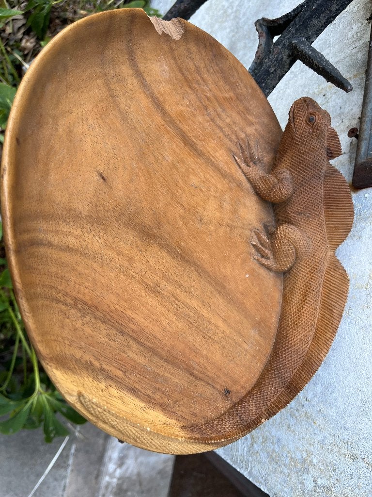 Houten bord leguaan, Ophalen