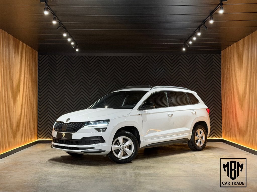 ✅ Skoda Karoq 1.5TSI Sportline DSG Pano Cockpit LED ACC 1eig, Auto's, Skoda, Stof, 1498 cc, 4 cilinders, Wit
