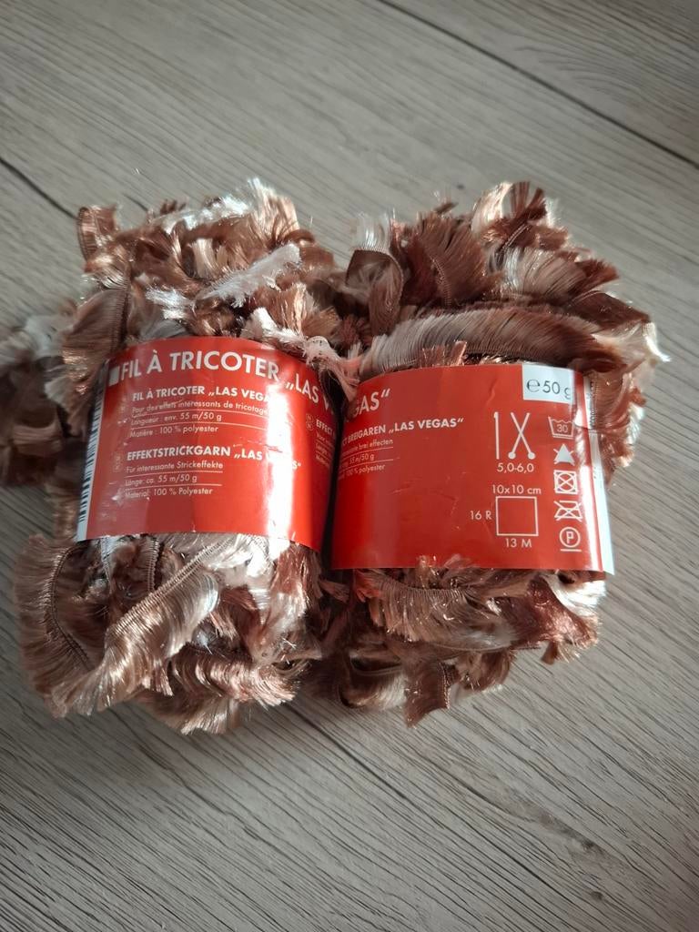 2 bollen fil à tricoter, Enlèvement