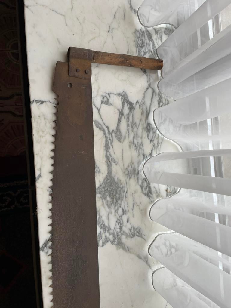 Boom zaag, Ophalen