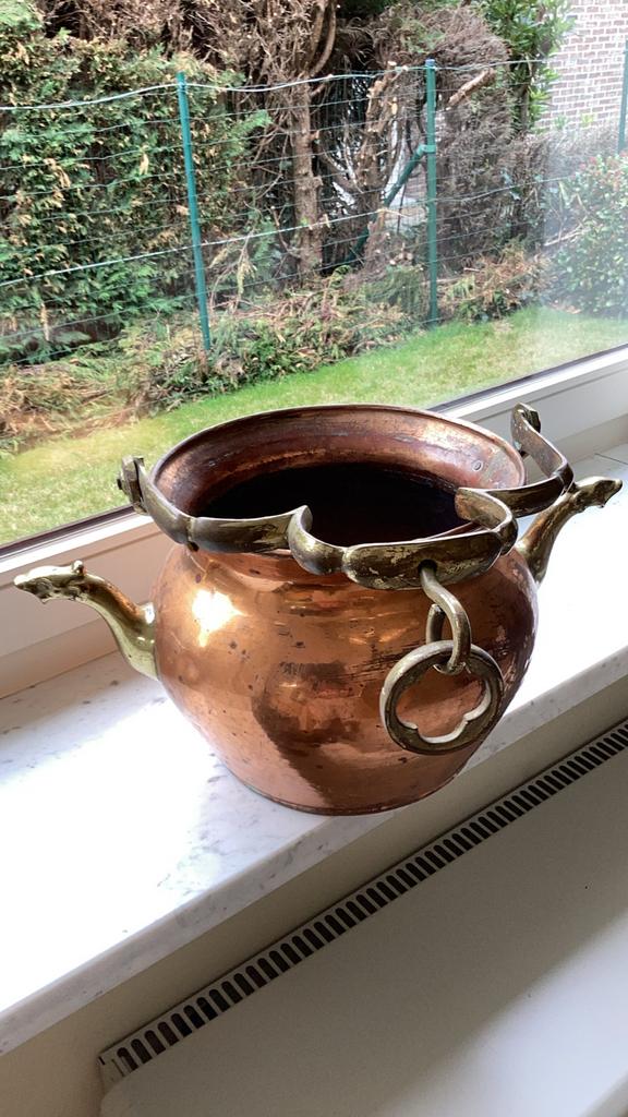 Mooie kopere pot, Ophalen