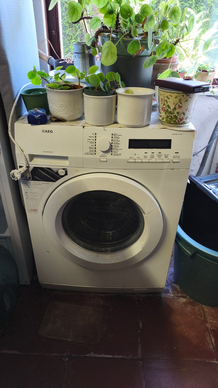 Wasmachine AEG, Ophalen