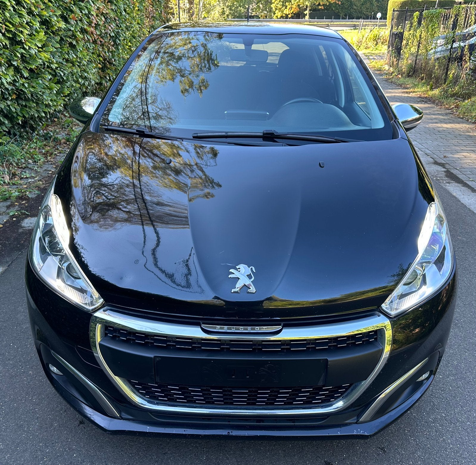Peugeot 208 facelift styl editie/5deurs/airco/navi/gekeurd, Auto's, Voorwielaandrijving, Verwarmde buitenspiegels, Stof, 1199 cc