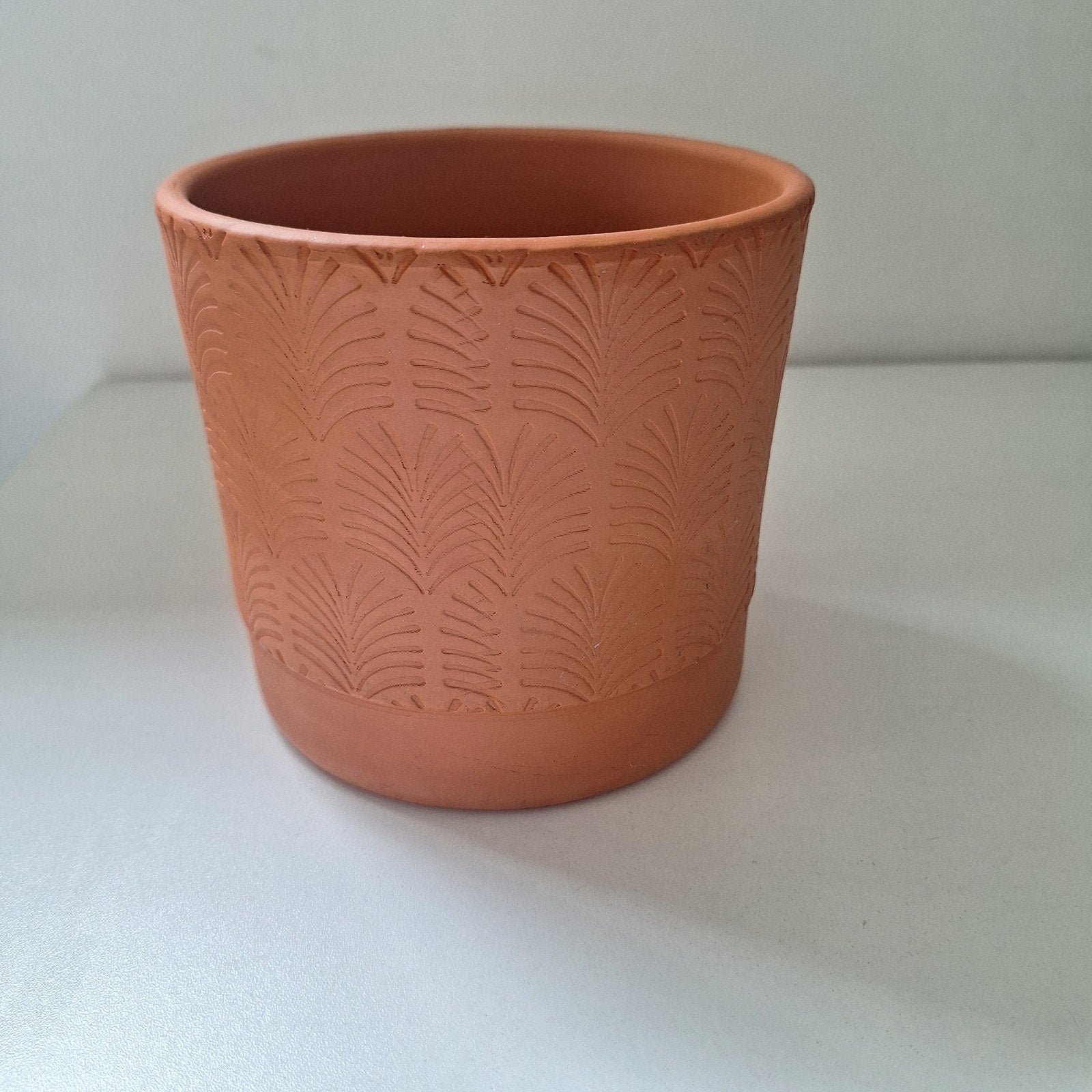 Terracotta bloempotje, Ophalen, Terracotta