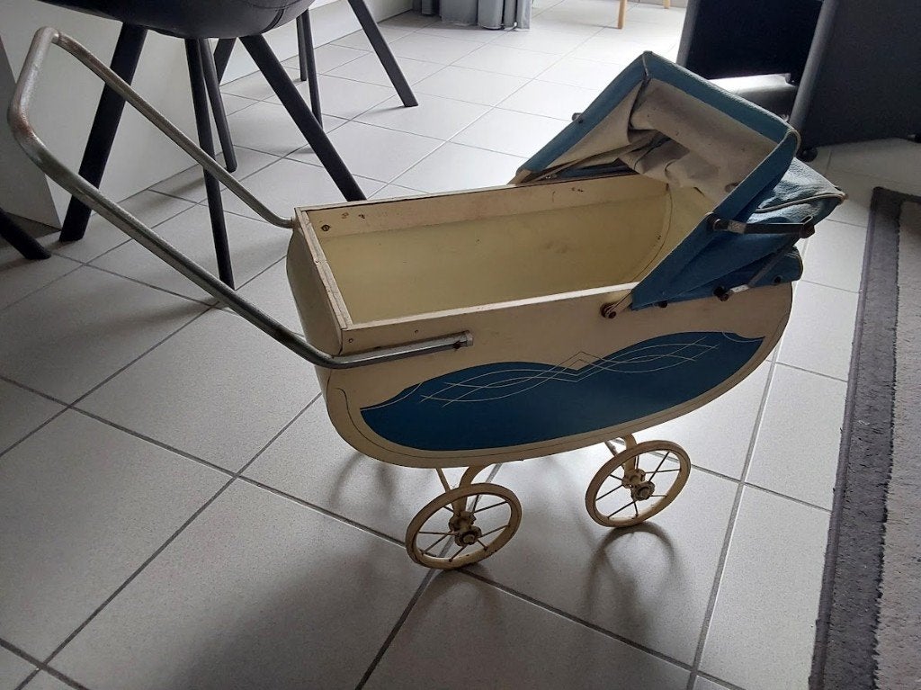 kinderkoets speelgoed, Ophalen
